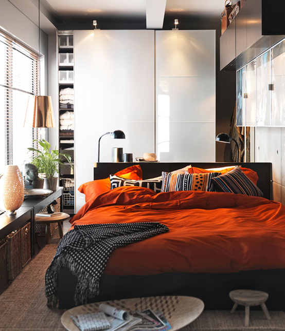 Orange-Pillows-and-Blanket-in-Small-Space-Bedroom-Design-and-Decorating-Ideas-2011-by-IKEA