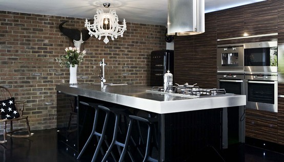 Contemporary kitchen with dark  brick wall