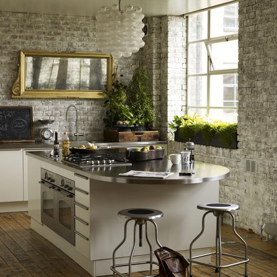 Elegant Kitchen with brick wall