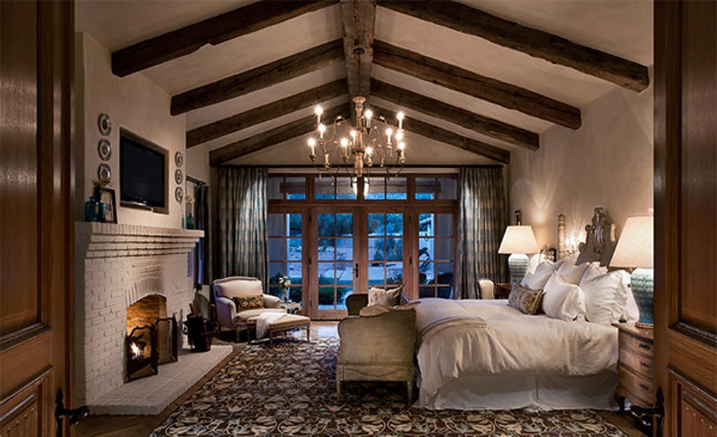 Country Side Bedroom with Exposed Roof beams on Chatedral Ceiling