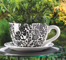Big teacup flower pot - via ebay.com 