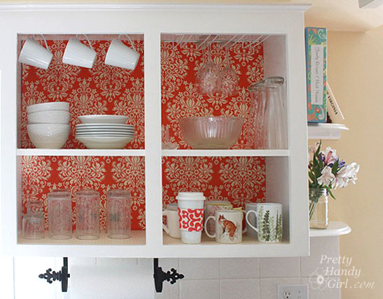 Cabinet with fabric backing via Brittany Bailey 