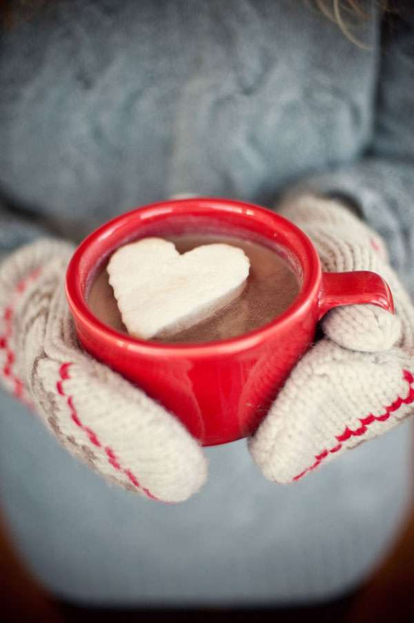 Freeze whipped cream on a cookie sheet and use a cookie cutter to make hot chocolate hearts.