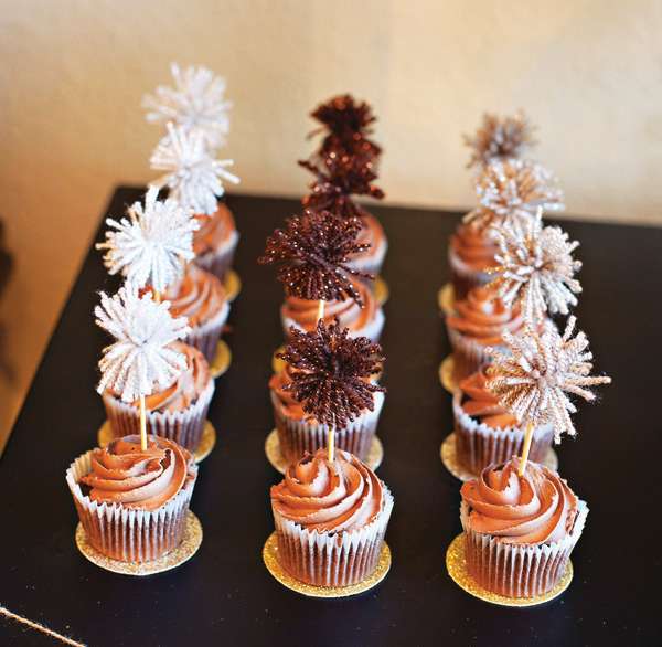metallic yarn pom-poms as cupcake toppers.