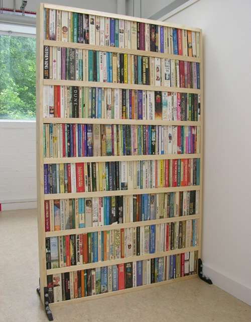 Divide the room in style with a book partition