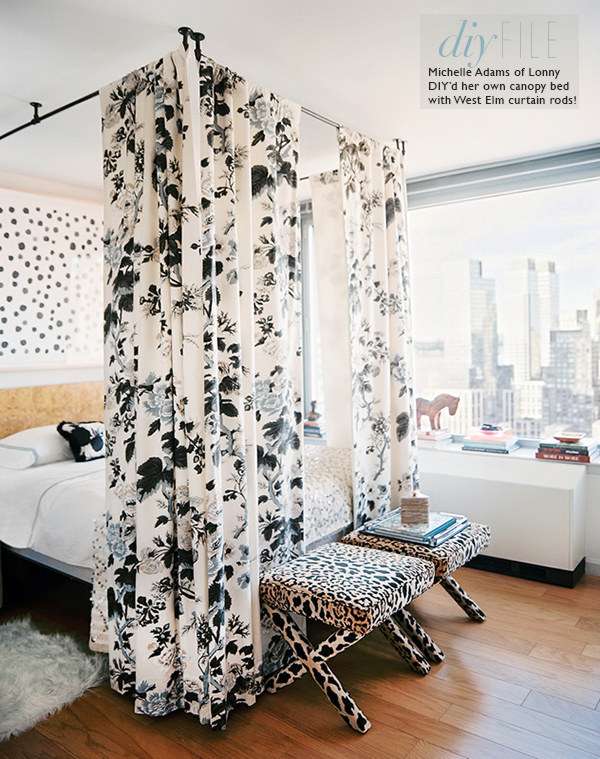 Hang curtain rods to create a makeshift canopy bed.