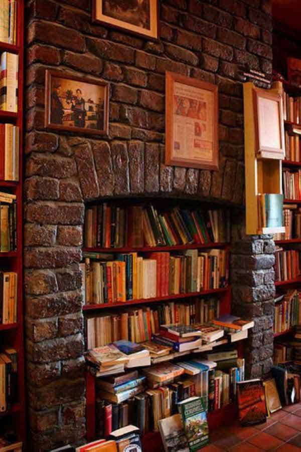 Tall Stone Stacked Fireplace Turned Into Library