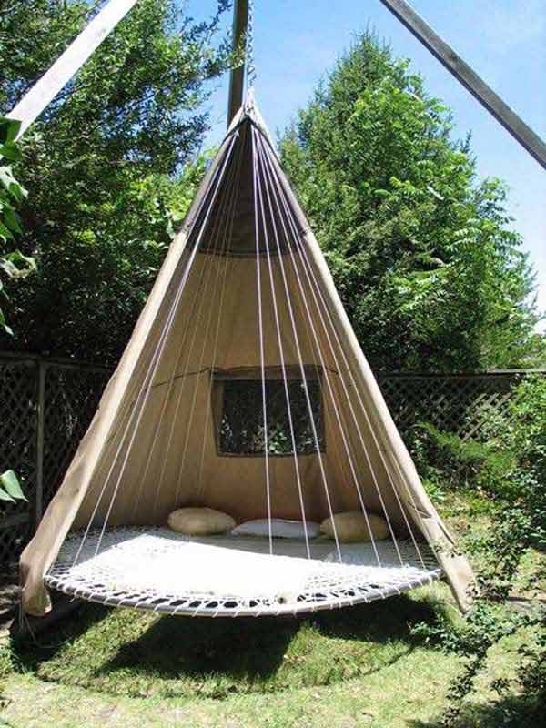 a tree-house, a hammock, a tire swing and a trampoline,