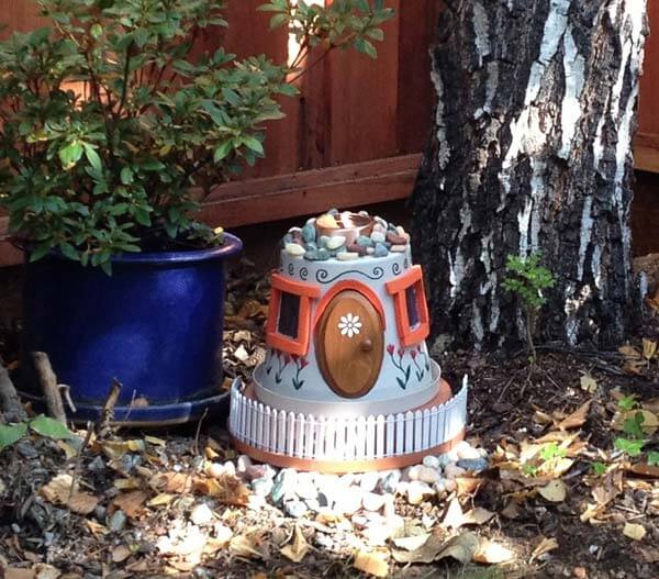 clay pot to as a fairy or Gnome house