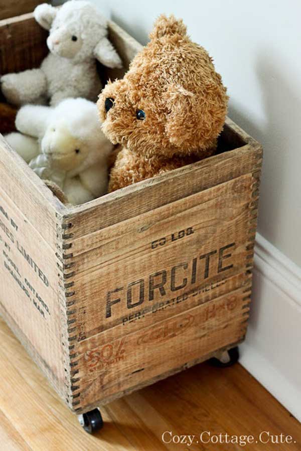 Rustic wooden crate on wheels for toy Storage