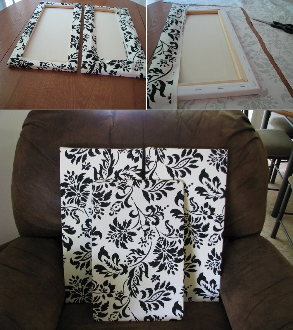 Black fabric wrapped over canvas wall hanging 