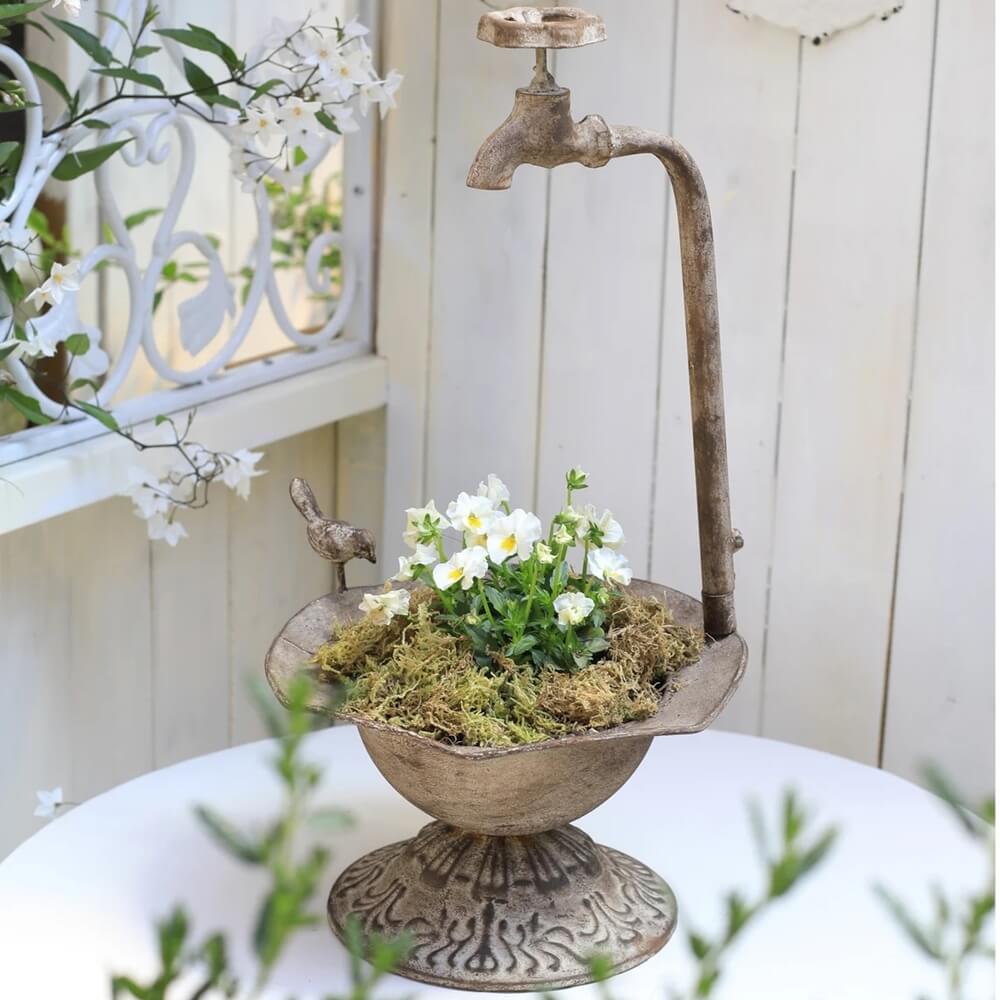 Flowers in a Vintage Tap Birdbath