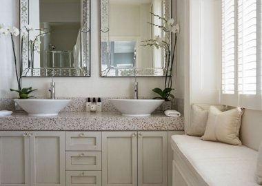 White-bathroom-with-built-in-storage-and-window-seat