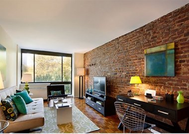 Sophsiticated Living Room with Brick wall design