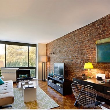 Sophsiticated Living Room with Brick wall design